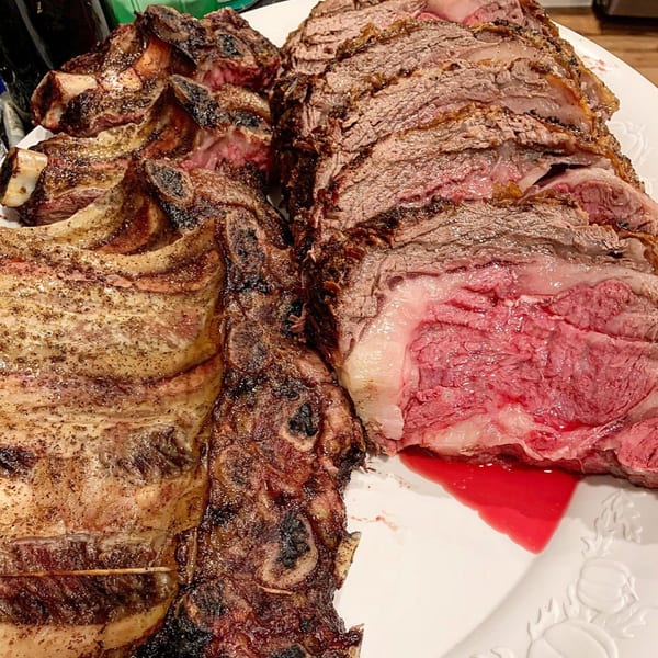A platter of perfectly cooked prime rib, sliced and ready to serve at Cogman's Creek.
